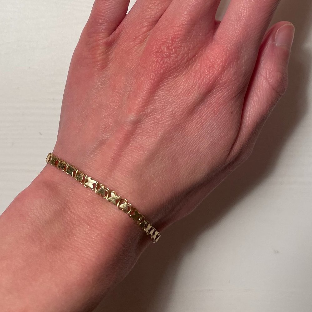 14K Yellow Gold Heart Link Bracelet with X and Heart Pattern